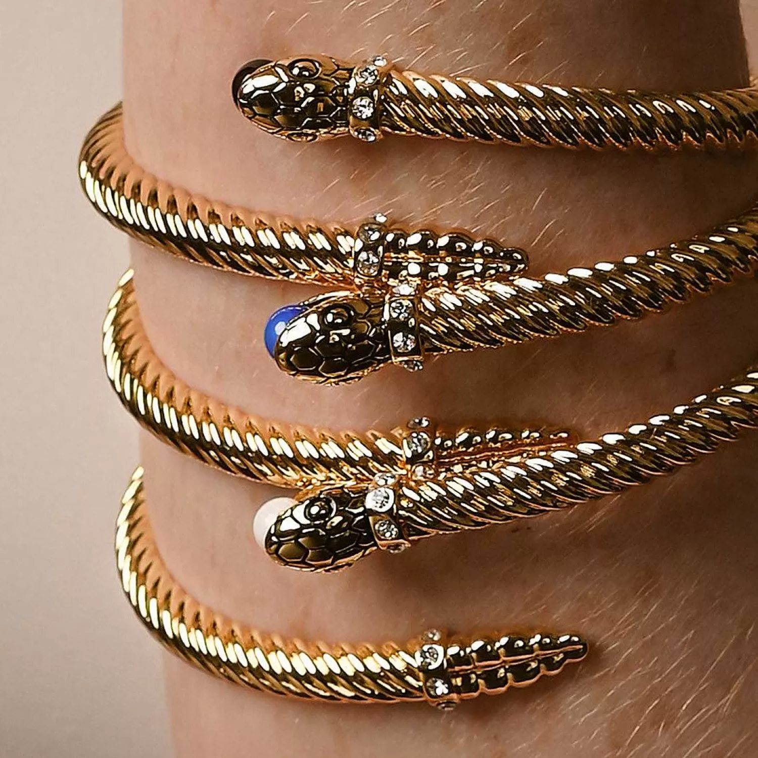 Halcyon Days Snake Twist Black & Gold Bangle | Best
